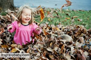 Playing in Leaves, Childhood